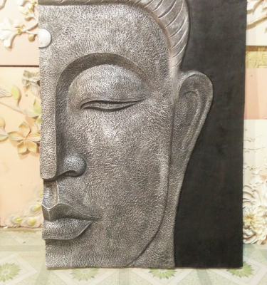 Phù điêu chân dung phật