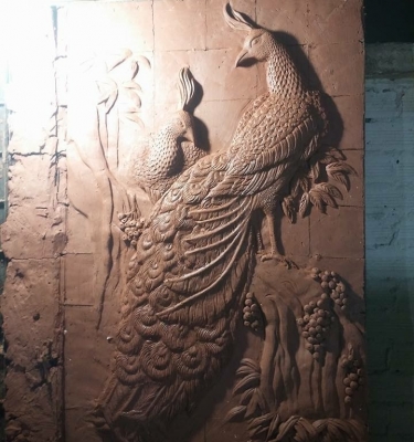 Phù điêu  chim công