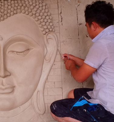 Phù điêu chân dung phật